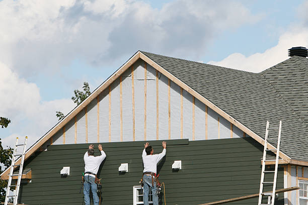 Professional Siding technician working in Gibsonville, NC